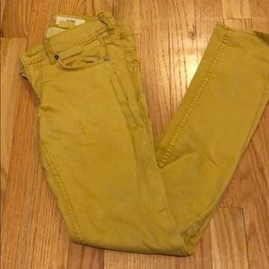 Mustard colored skinny jeans